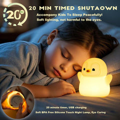 DREAMING MY DREAM penguin night light side angle highlighting soft BPA-free silicone.