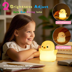 DREAMING MY DREAM penguin night light touch-control for quick brightness adjustments.