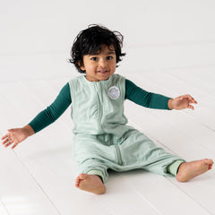 Dreamland Baby sleep sack close-up reveals LuxeWeave viscose texture on skin.