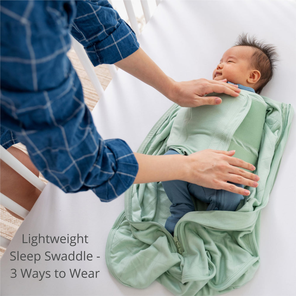 Dreamland Baby Viscose Swaddle Sage arms-in view demonstrates three-way adjustability for newborns