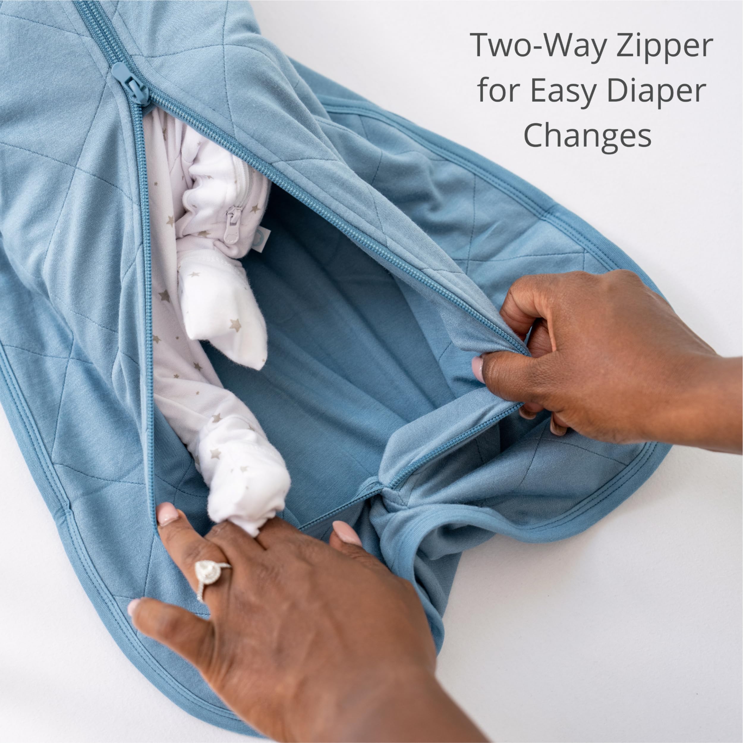 Dreamland Baby Viscose Swaddle Sage newborn-use scene emphasizes lightweight comfort for sleep