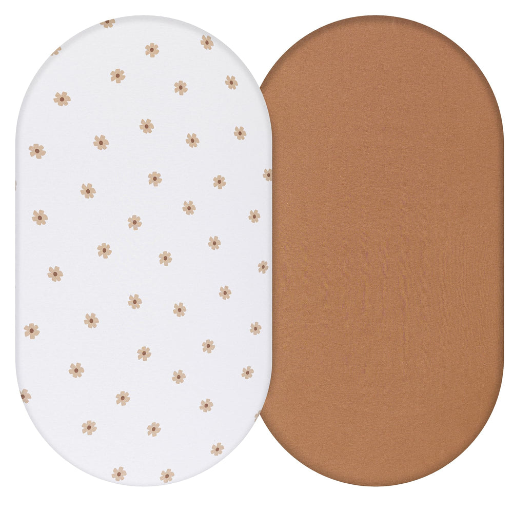 Dreamology bassinet sheets packaged for gifting with ready-to-use appeal.