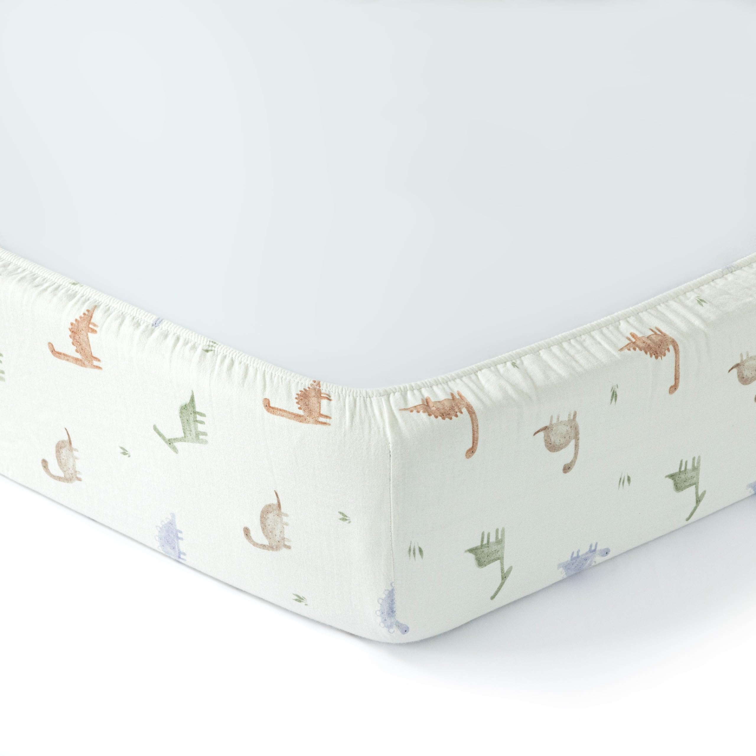 Dreamology crib sheet close-up emphasizes deep pocket for secure coverage.