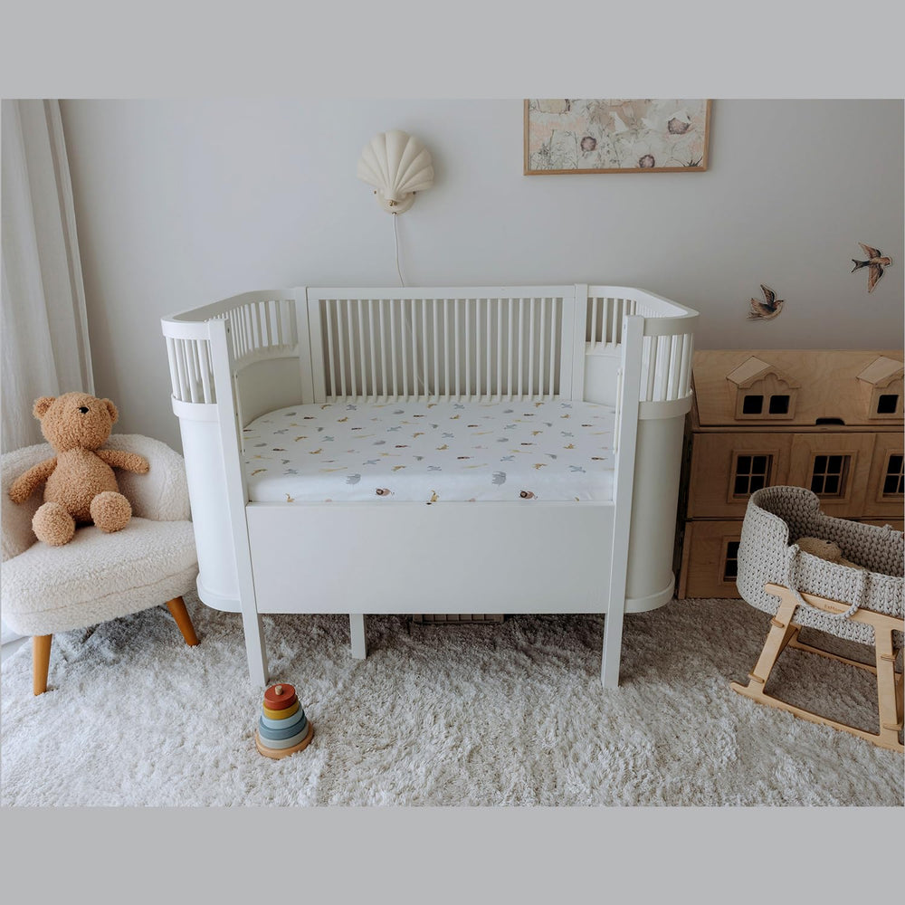 Dreamology crib sheets in color options to match nursery decor