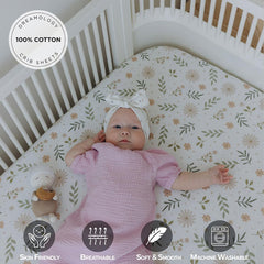 Dreamology crib sheets green-flowers folded on a crib mattress support smooth nights