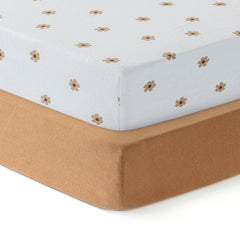 Dreamology crib sheets two-pack in soft jersey offer gentle baby skin comfort.