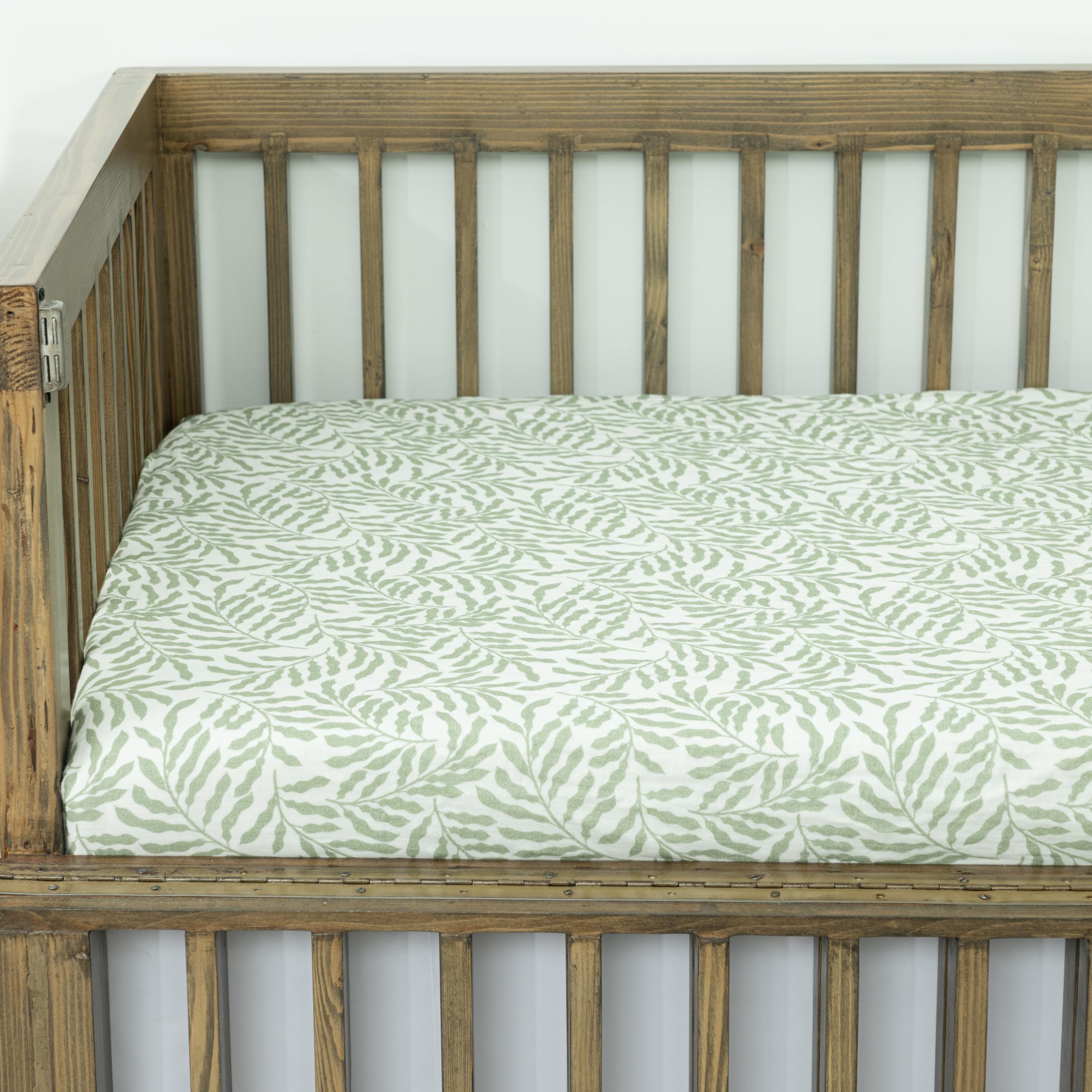 Dreamology Leaves muslin crib sheet elastic edges provide slip-free crib fit