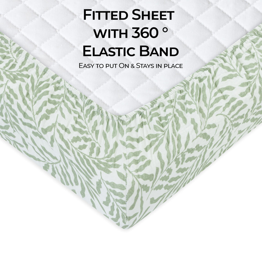 Dreamology Leaves muslin crib sheet folded to show soft cotton for sensitive skin