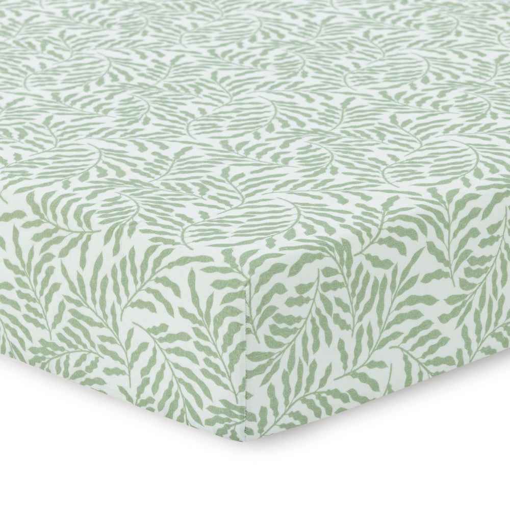 Dreamology Leaves muslin crib sheet packaged for gifting with breathable fabric