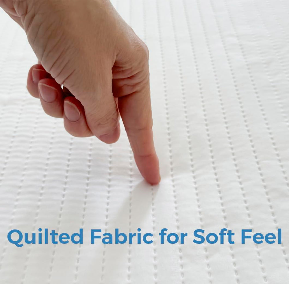 Dreamology quilted cover shown on protector for extra-soft, cozy sleep surface.