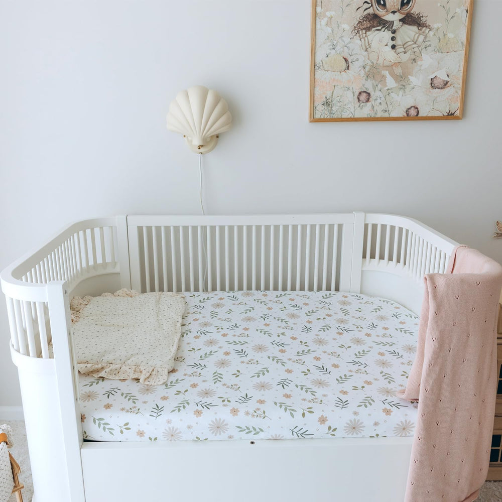 Dreamology muslin crib sheets closeup fabric: breathable, gentle surface ideal for sensitive baby skin.