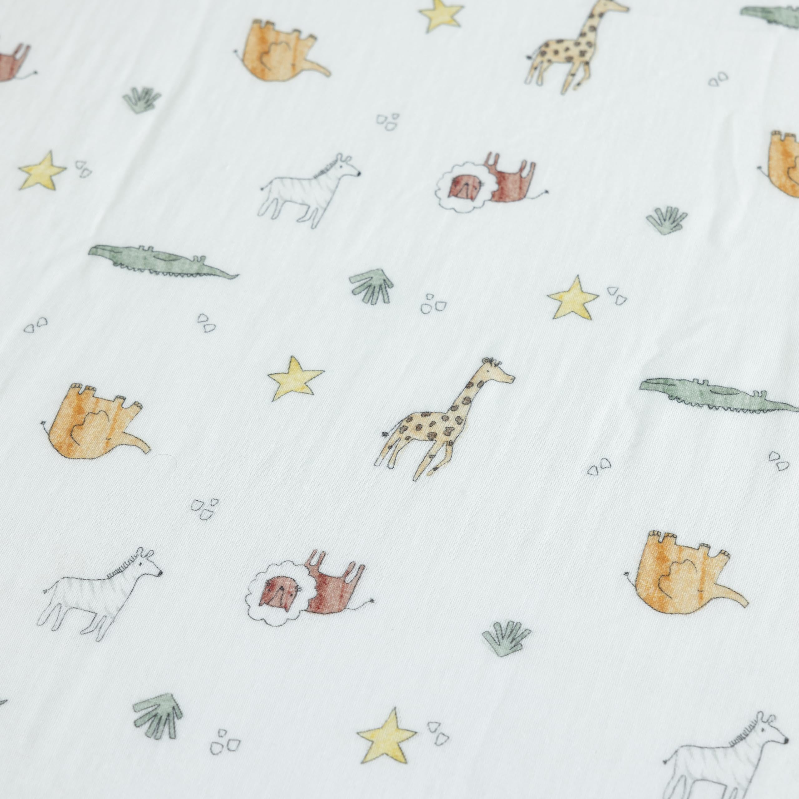 Dreamology muslin crib sheets being machine washed demonstrates easy care.