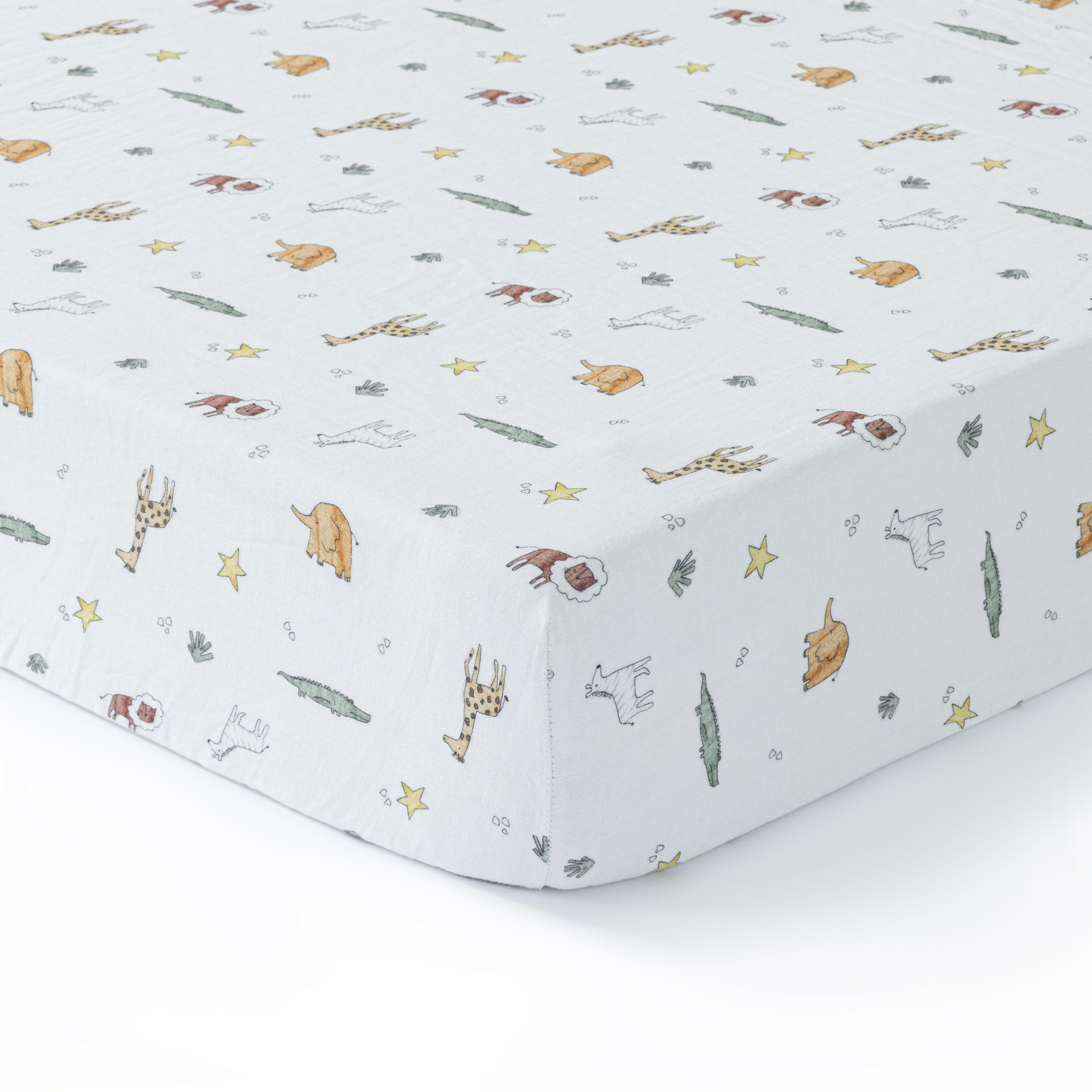 Dreamology muslin crib sheets on a standard crib mattress offer breathable comfort.