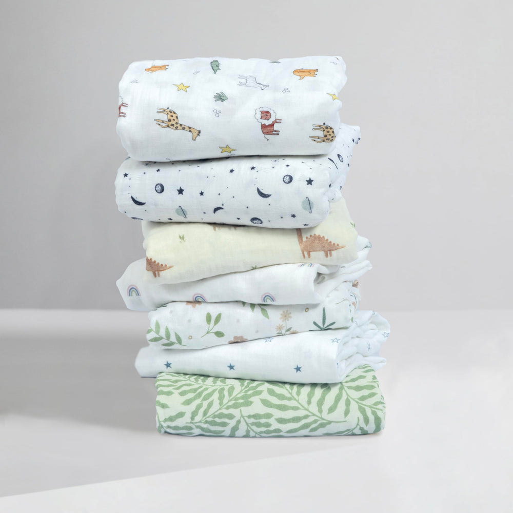 Dreamology Planets crib sheets in multiple colors to enhance nursery decor.
