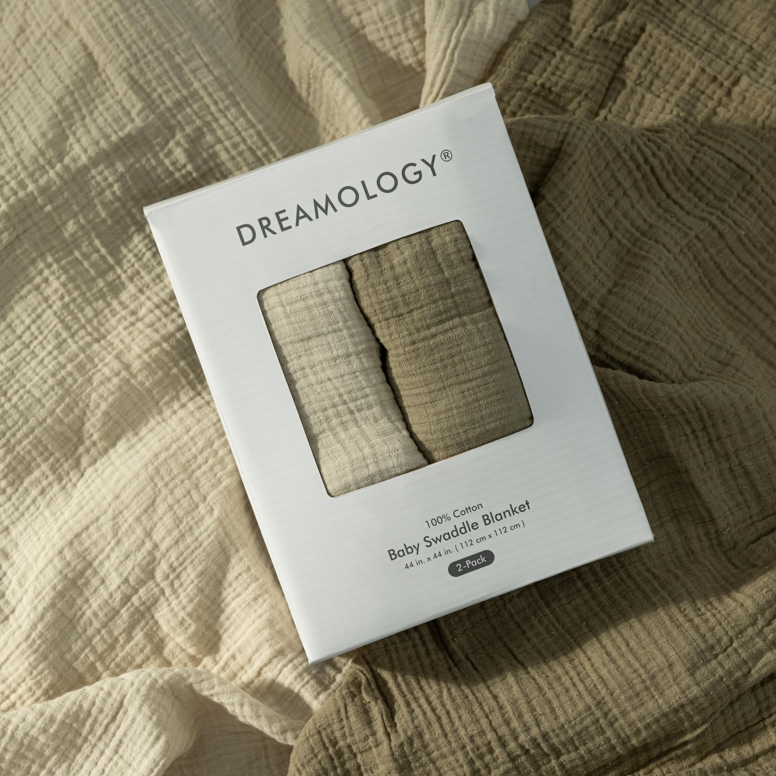 Dreamology receiving blanket acru folded offers easy wrap for newborn comfort.