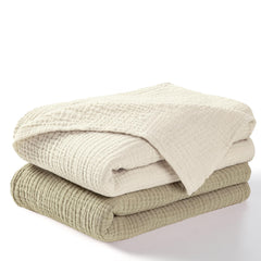 Dreamology receiving blanket olive folded for on-the-go swaddling.
