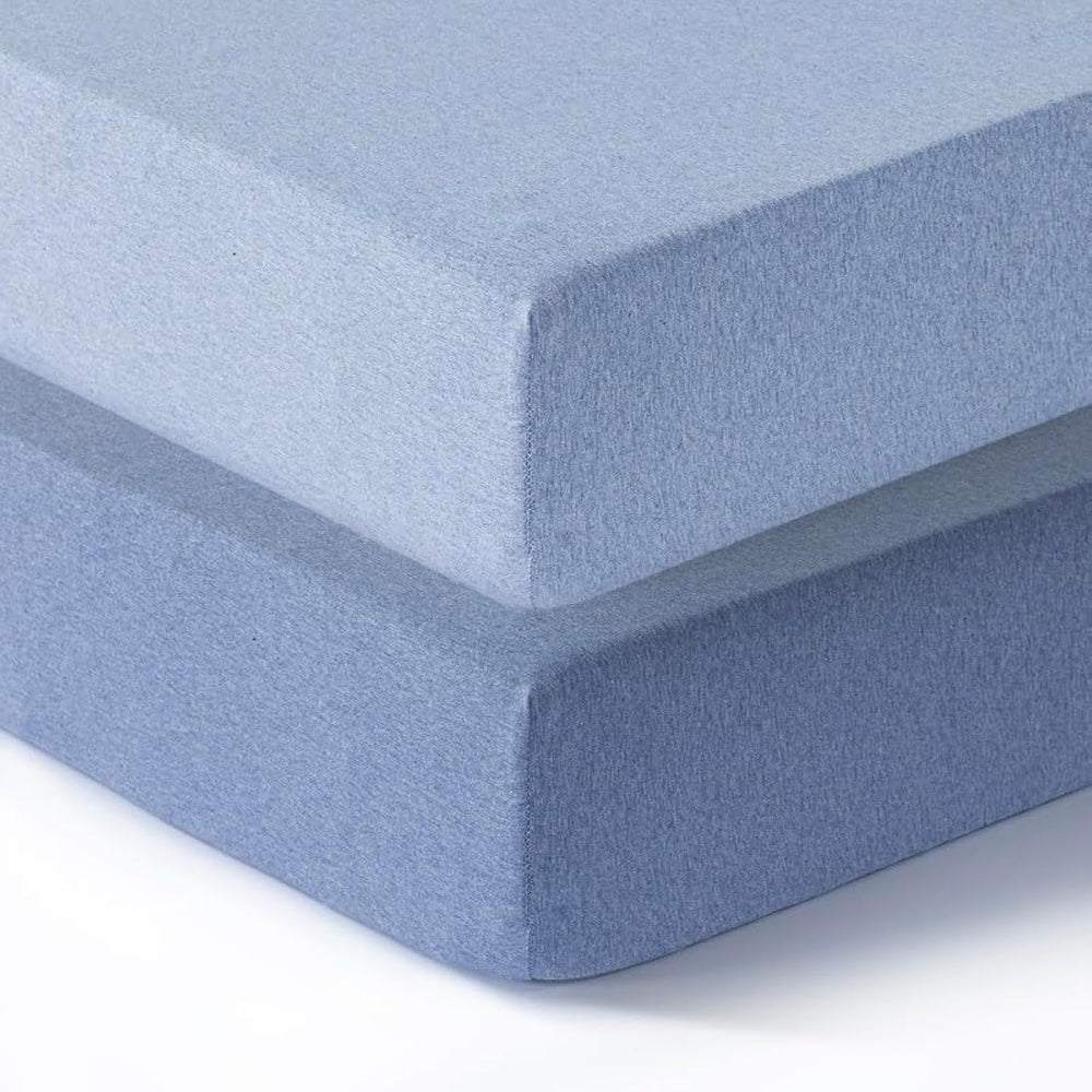 Dreamology standard crib sheet denim blue on mattress showing snug fit
