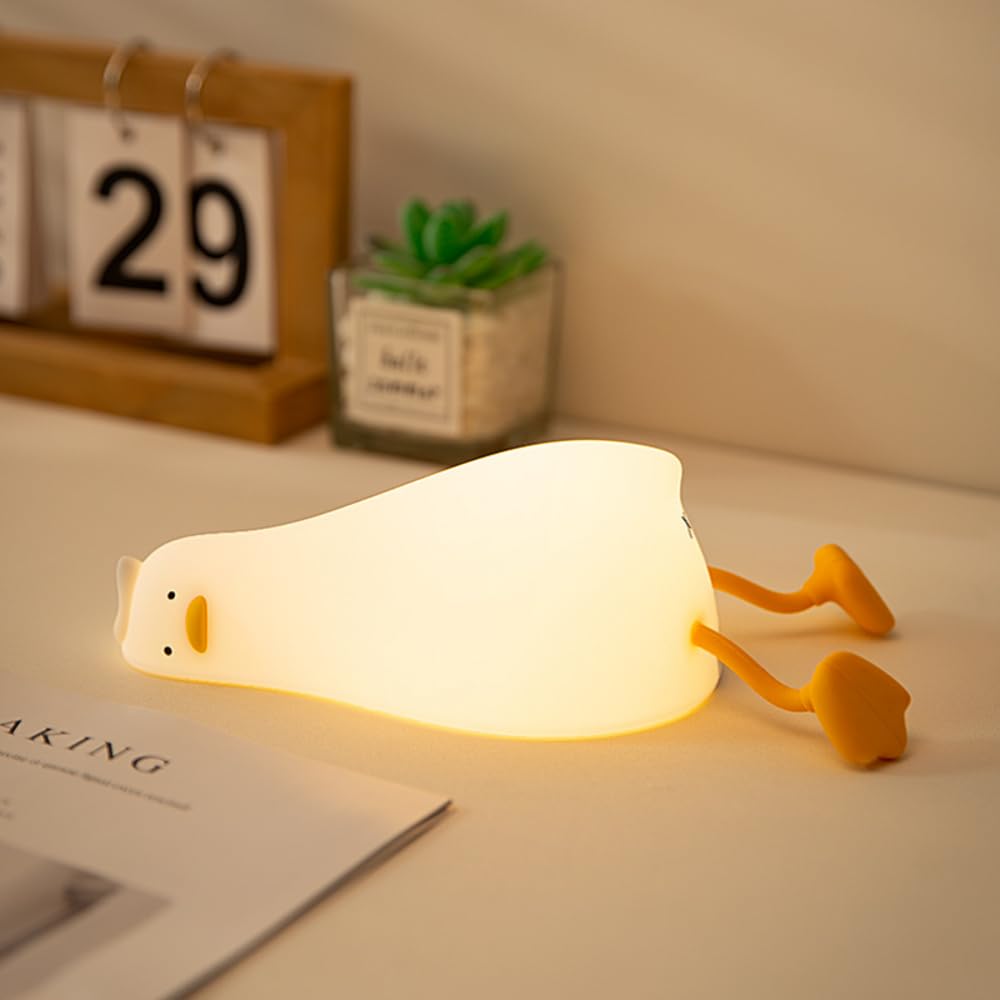 Drecoam Benson lying flat duck night light offers gentle glow for late-night feedings.