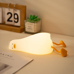 Drecoam Benson lying flat duck night light offers gentle glow for late-night feedings.