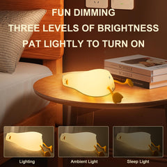 Drecoam Duck Night Light shows the phone-stand feature for hands-free use.
