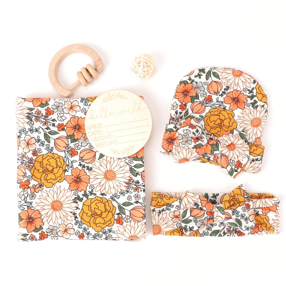 BQUBO bow hat on newborn adds style and warmth.