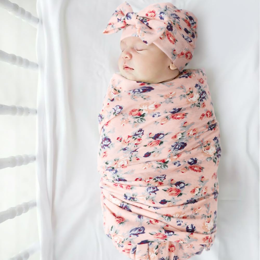 DRESHOW BQUBO baby headband with floral accents complements gentle outfits.