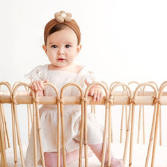 DRESHOW BQUBO baby headband on child demonstrates comfortable stretch
