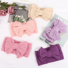 DRESHOW BQUBO bow detail highlights soft texture and handmade charm.