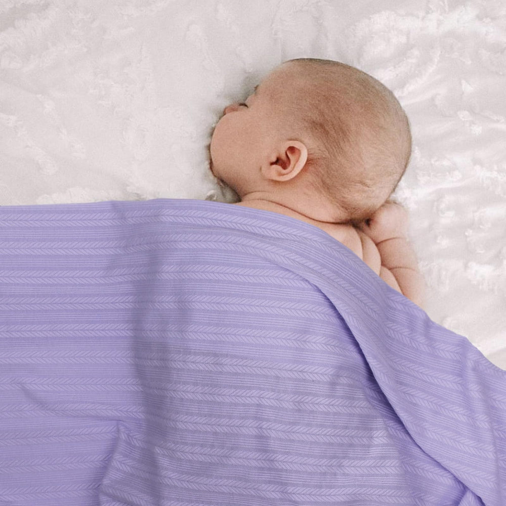 DRESHOW BQUBO multi-use blanket ready as nursing cover or stroller shade.