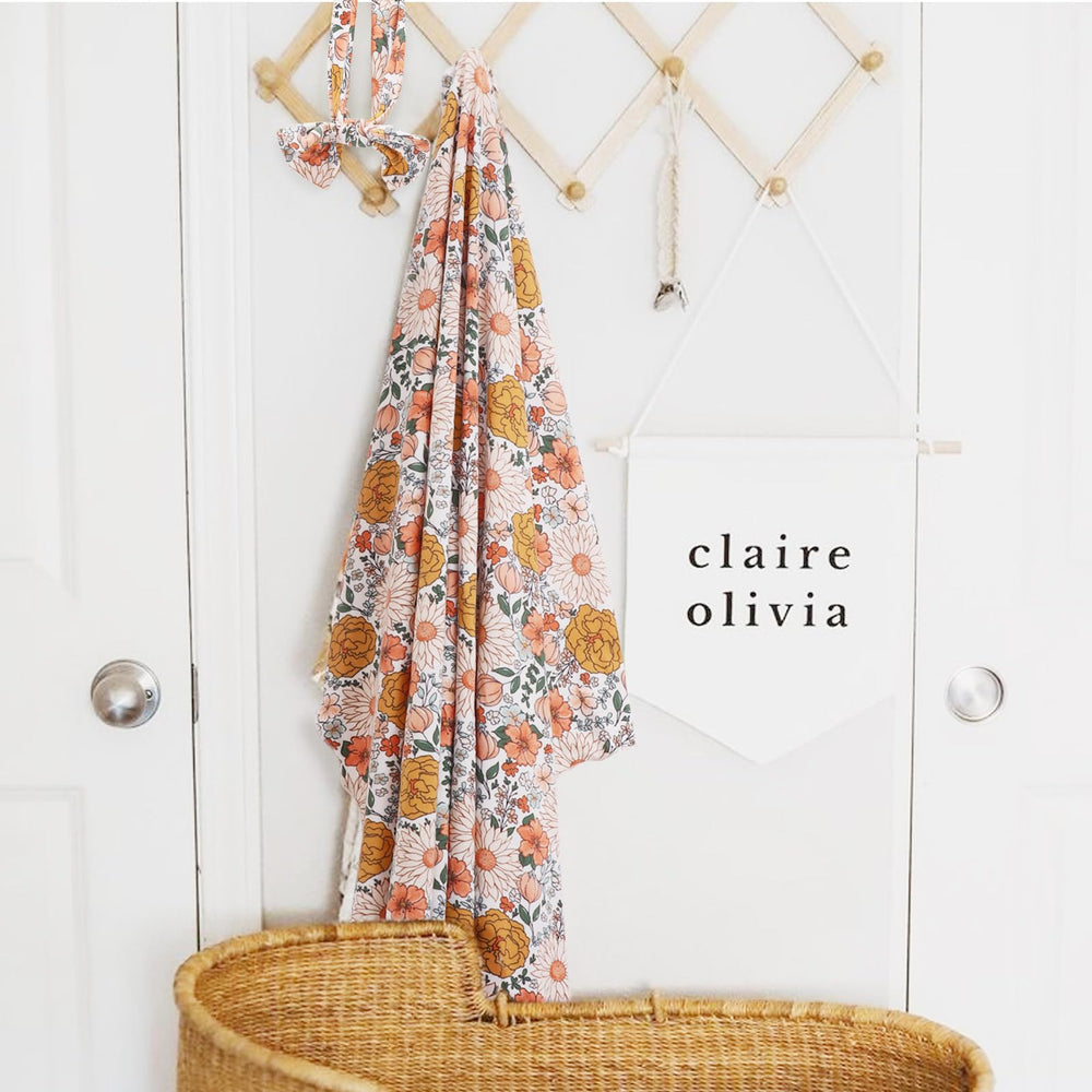 BQUBO floral pattern enhances newborn photos with charm.