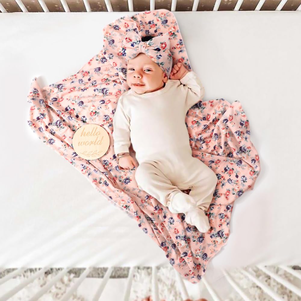 DRESHOW BQUBO newborn swaddle blanket secures baby during photos.