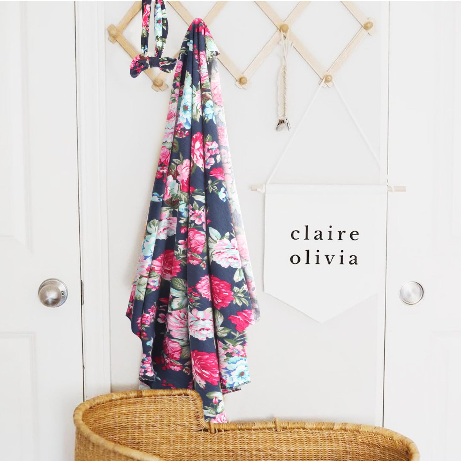 DRESHOW BQUBO nursery swaddle used as photo prop.