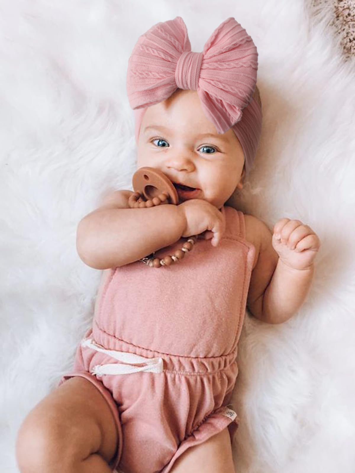 DRESHOW BQUBO stretchy nylon headband offers secure fit for growing babies.