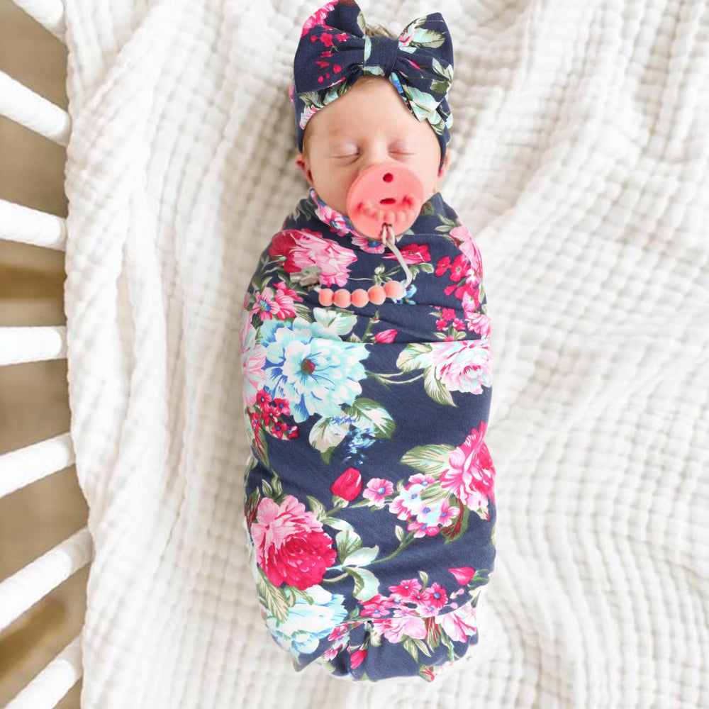 DRESHOW BQUBO swaddle blanket 31x30 inches for cozy swaddling.