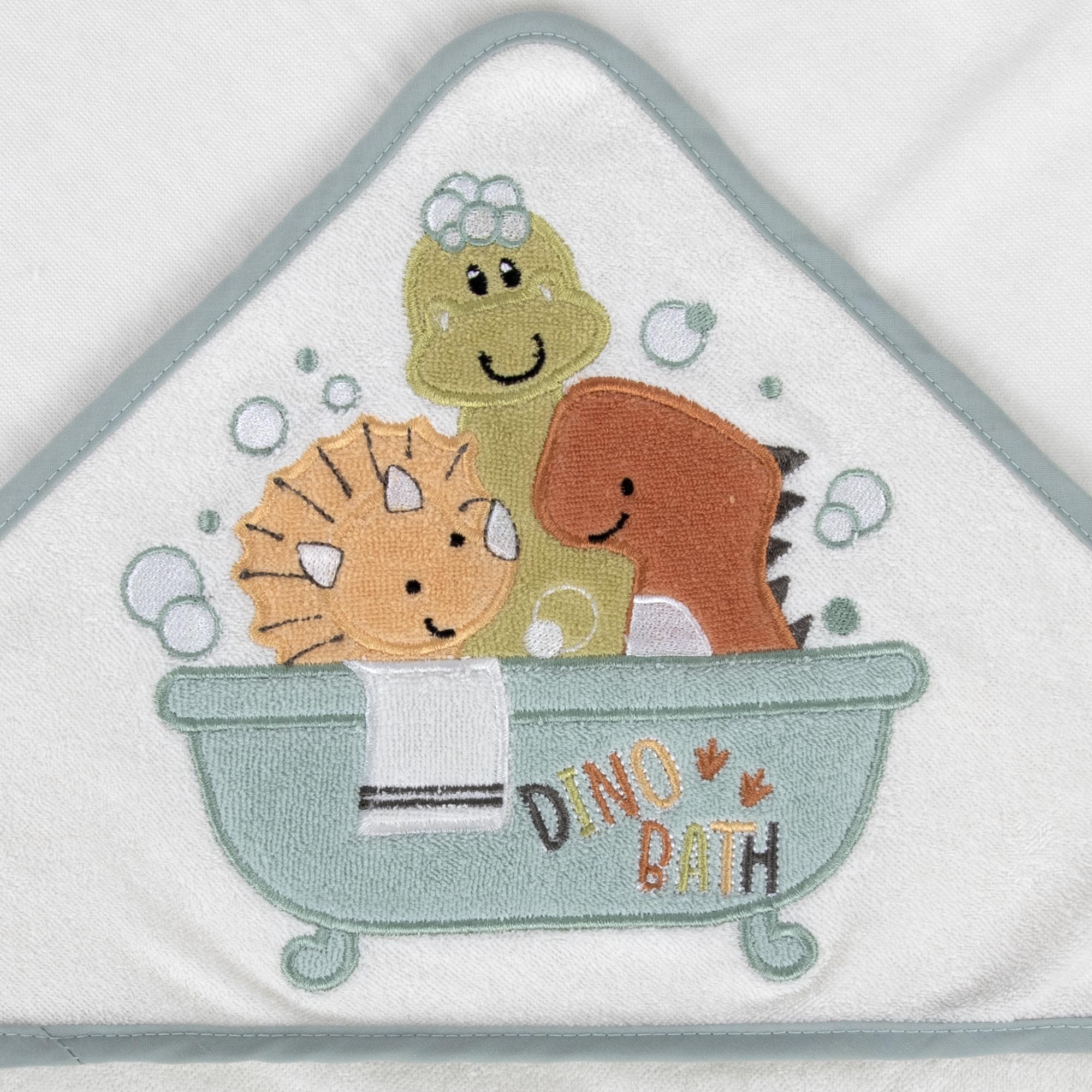 Drippy Dinos washcloths set provides soft cotton textures for gentle cleansing.