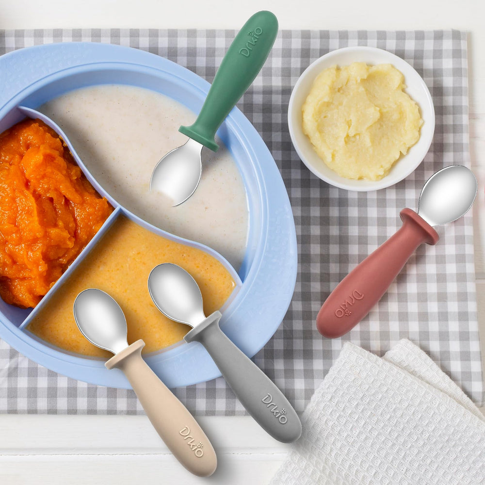 DRKIO toddler spoons in use during family mealtime promoting small-step independence