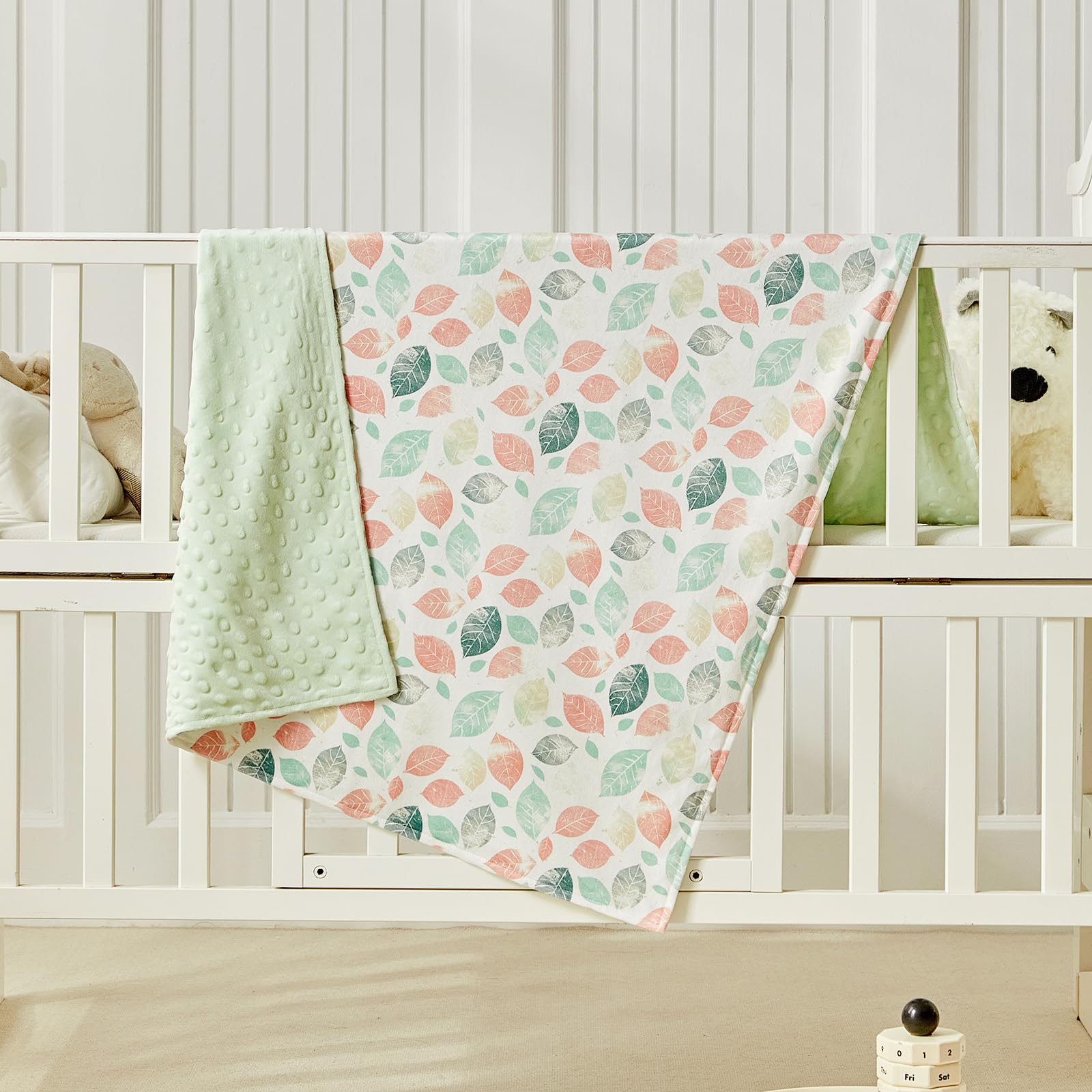 DuShow Leaf Baby Blanket for Girls on a stroller shows travel-friendly softness
