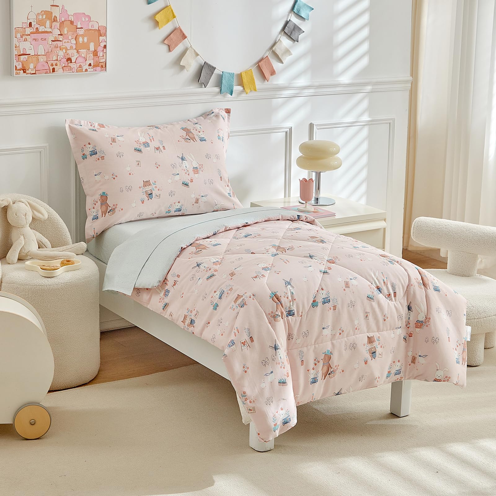 DuShow animal-pattern pink-side design adds playful charm to a toddler bed.