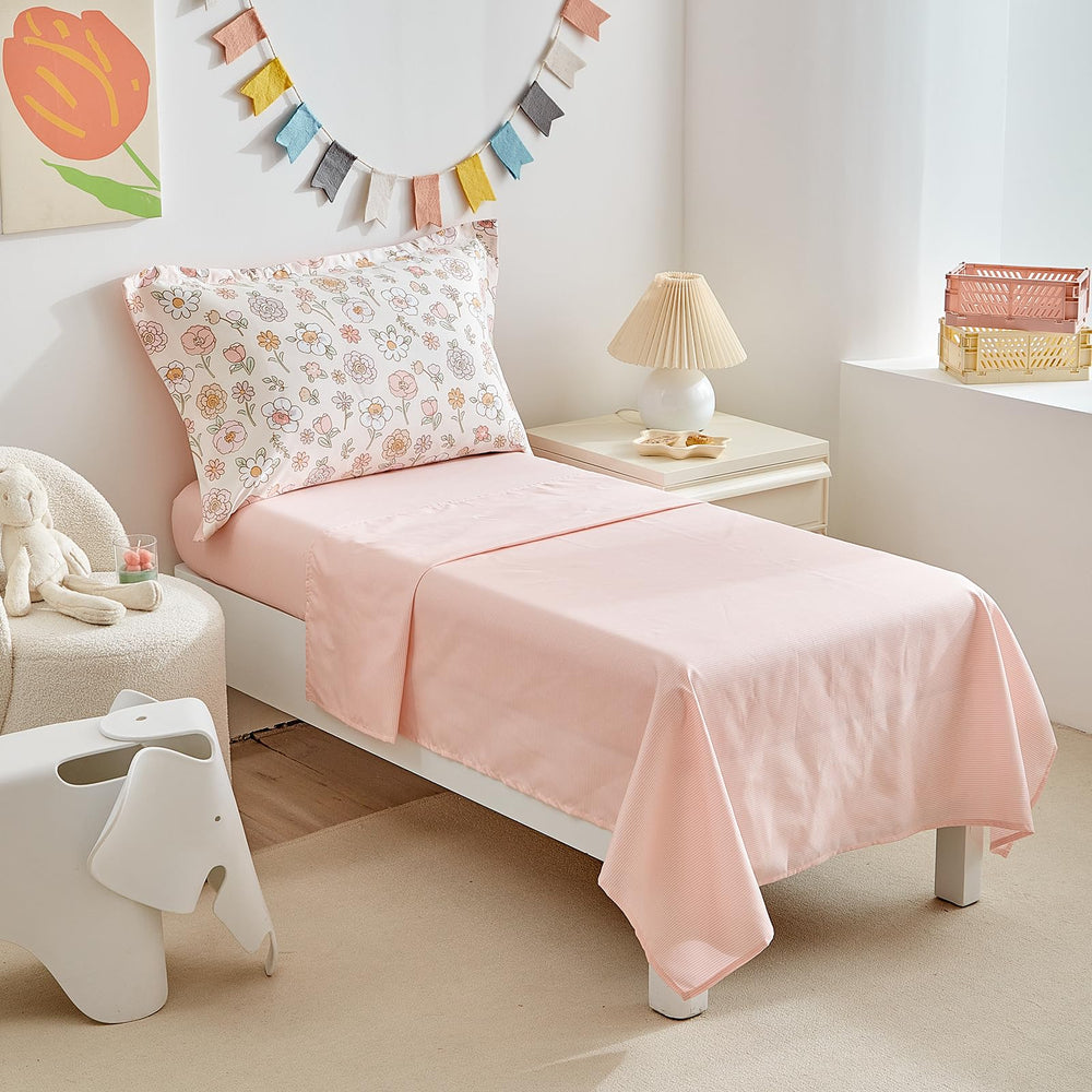 DuShow pink pillowcase coordinates with the set for quick styling and easy upkeep.