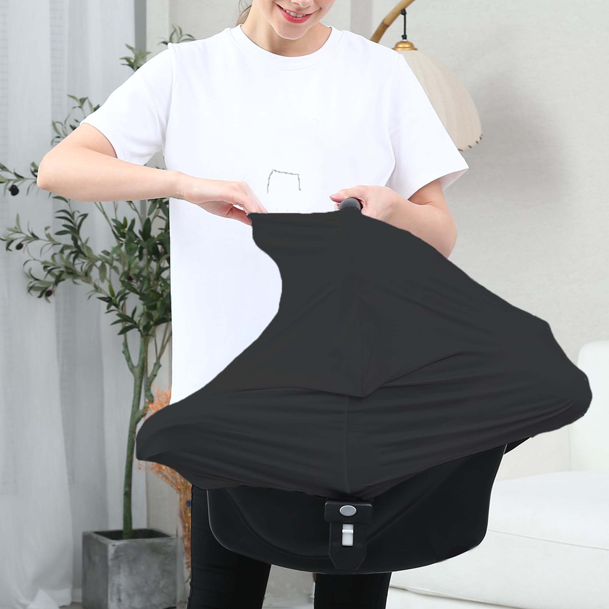 Dudeeghes carseat cover in-use nursing view shows breathable, stretchy fabric.