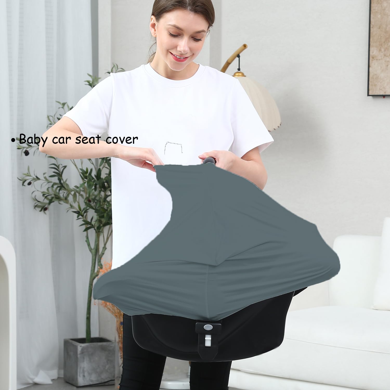 Dudeeghes nursing cover car seat enables private feeding in public.