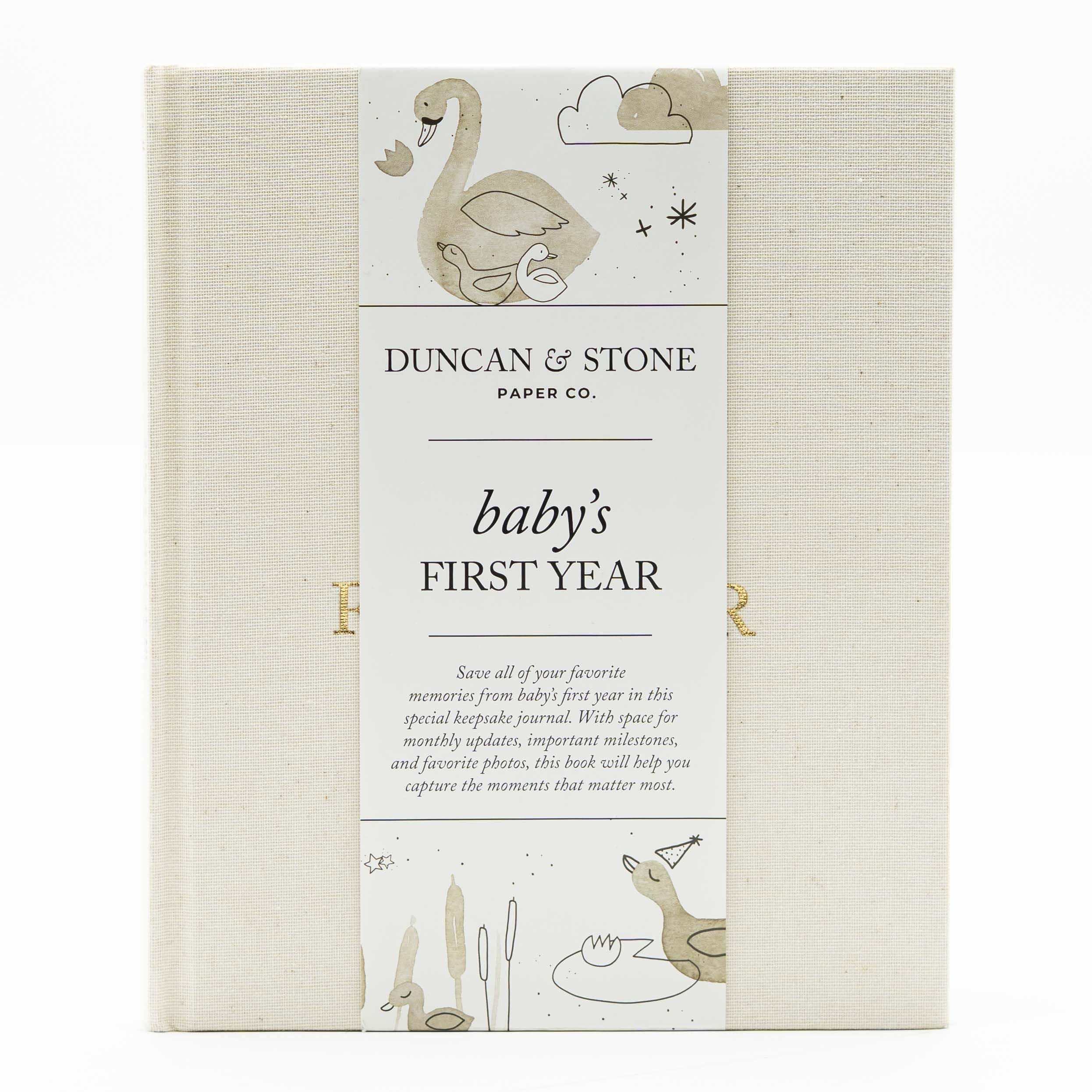 Duncan & Stone Baby First Year Book cover in cream highlights heirloom-quality design for cherished milestones.