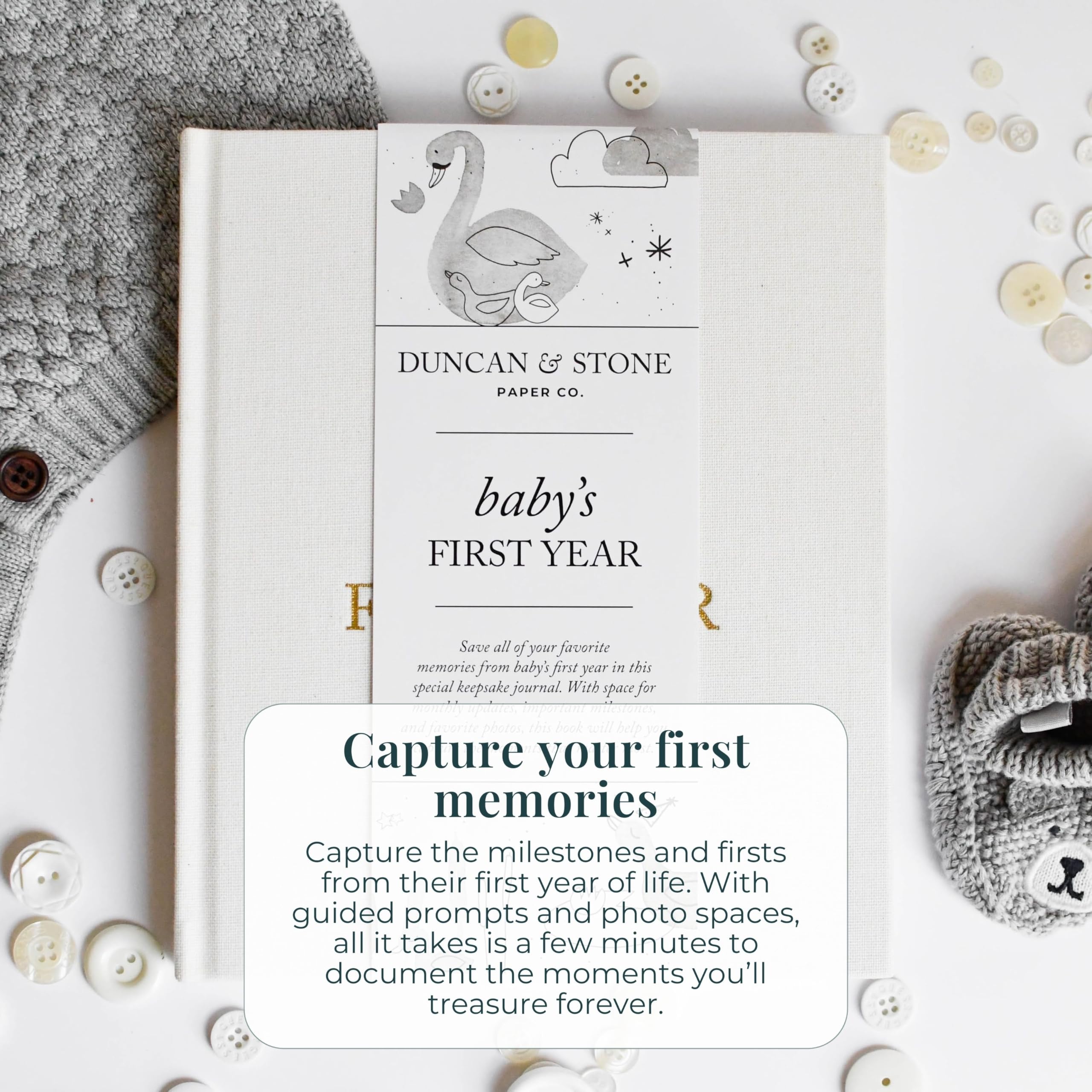 Duncan & Stone Baby First Year Book gold-foil detail adds elegant durability.