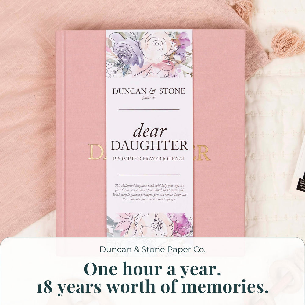 Photo pages invite sharing milestones with family in Duncan & Stone Journal.