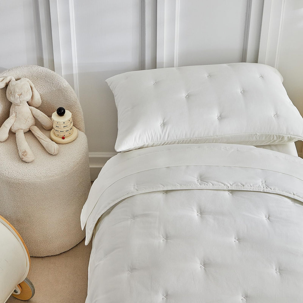 DuShow embroidery cross-stitch pattern adds simple stylish detail to toddler bedding
