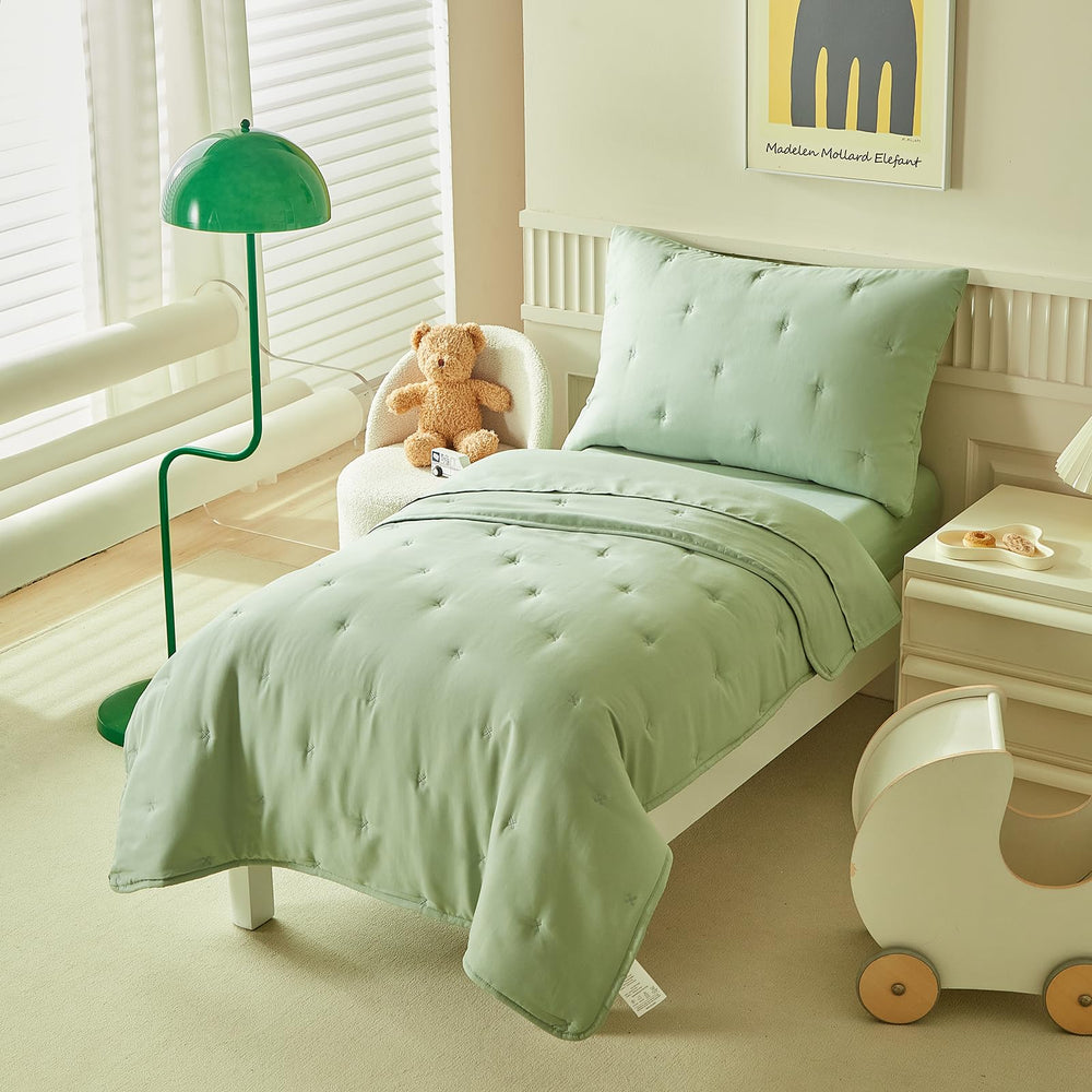 DuShow Green bedding set in bag ready-to-use bedtime solution for toddlers.