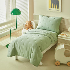 DuShow Green bedding set in bag ready-to-use bedtime solution for toddlers.