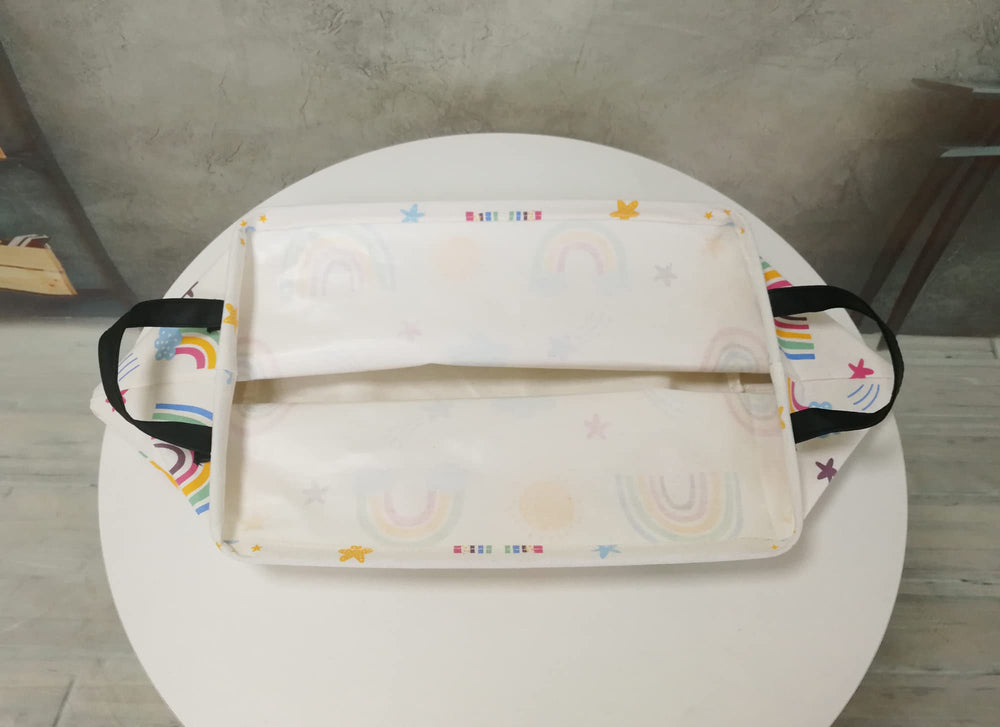 DUYIY Rainbow Rectangle Basket in living room helps organize toys and magazines