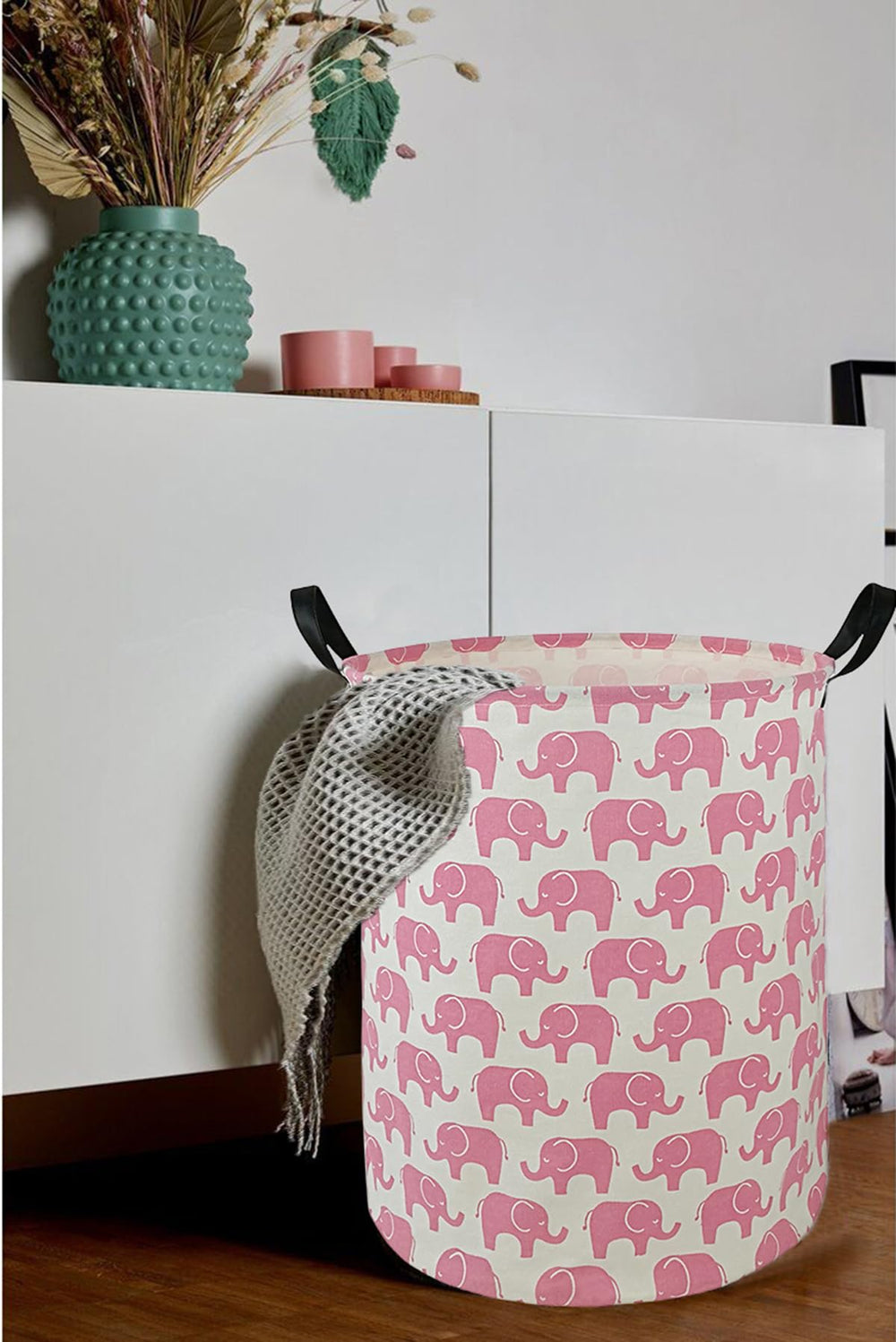 DUYIY round laundry hamper folded-stowed demonstrates collapsible storage saving space when not in use