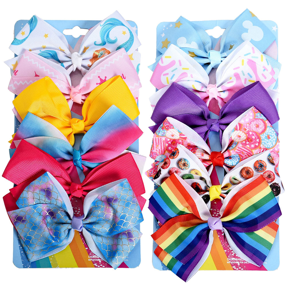 Dwenarry 12-pack rainbow heart bow with alligator clip secures toddler hair.